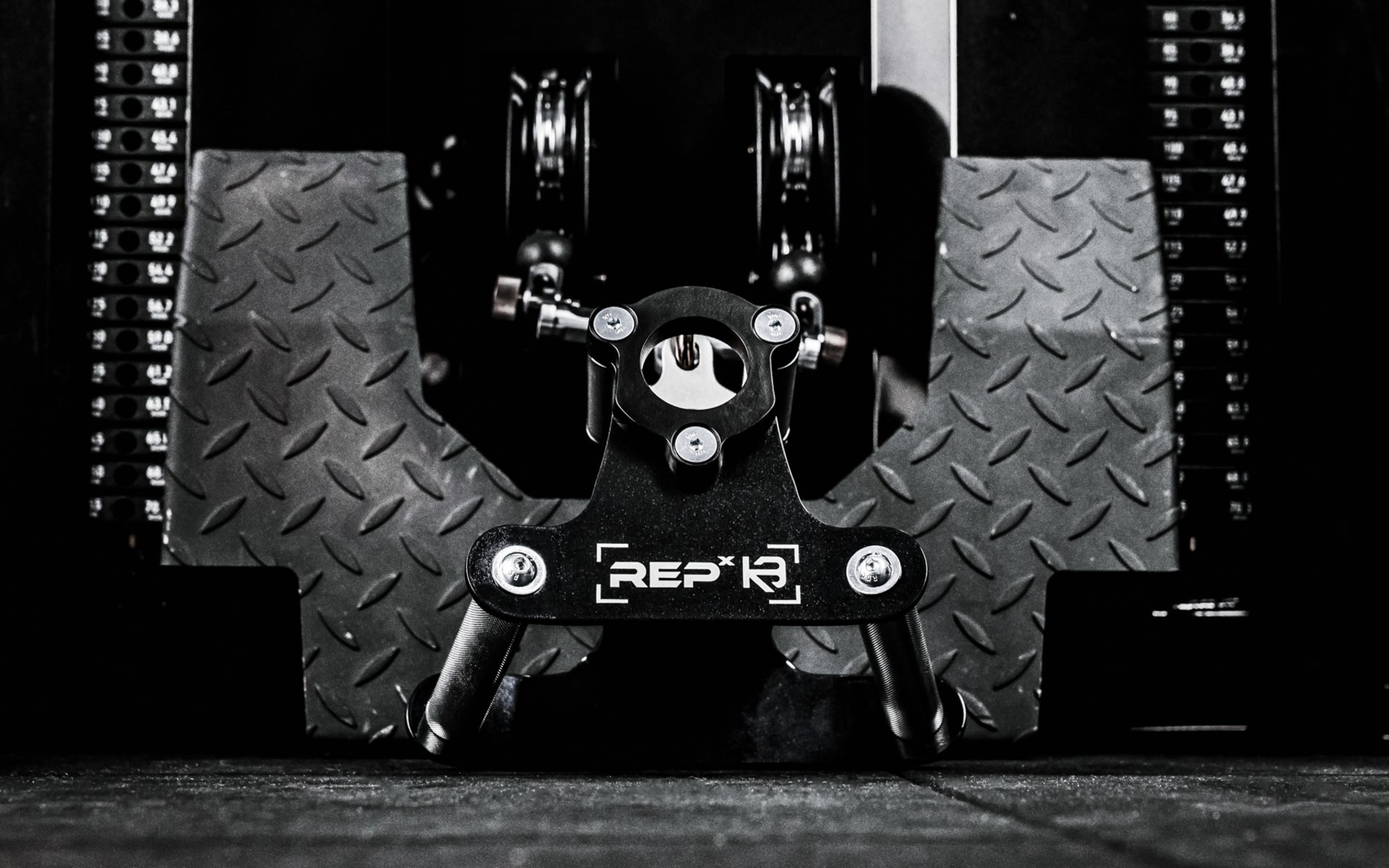 REP® x Kleva Built® Angled Atlas™ Close-Grip Cable and Landmine Attachment on the low row cable on an Ares™ 2.0